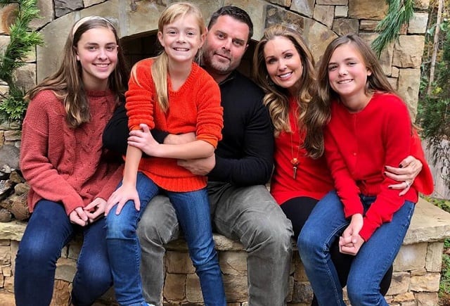 Christi Paul with her husband and daughters